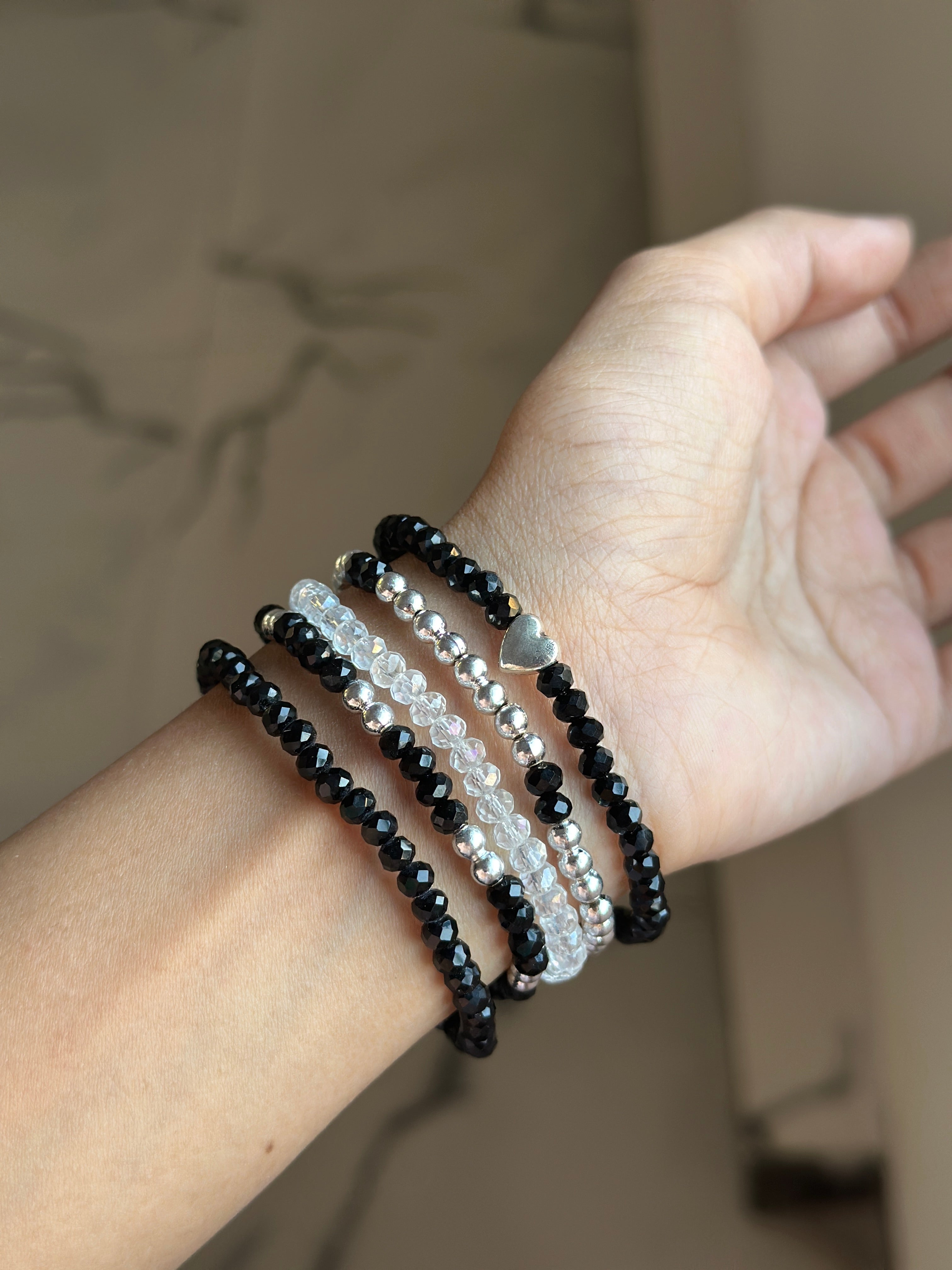 Black bracelet stack (p5)