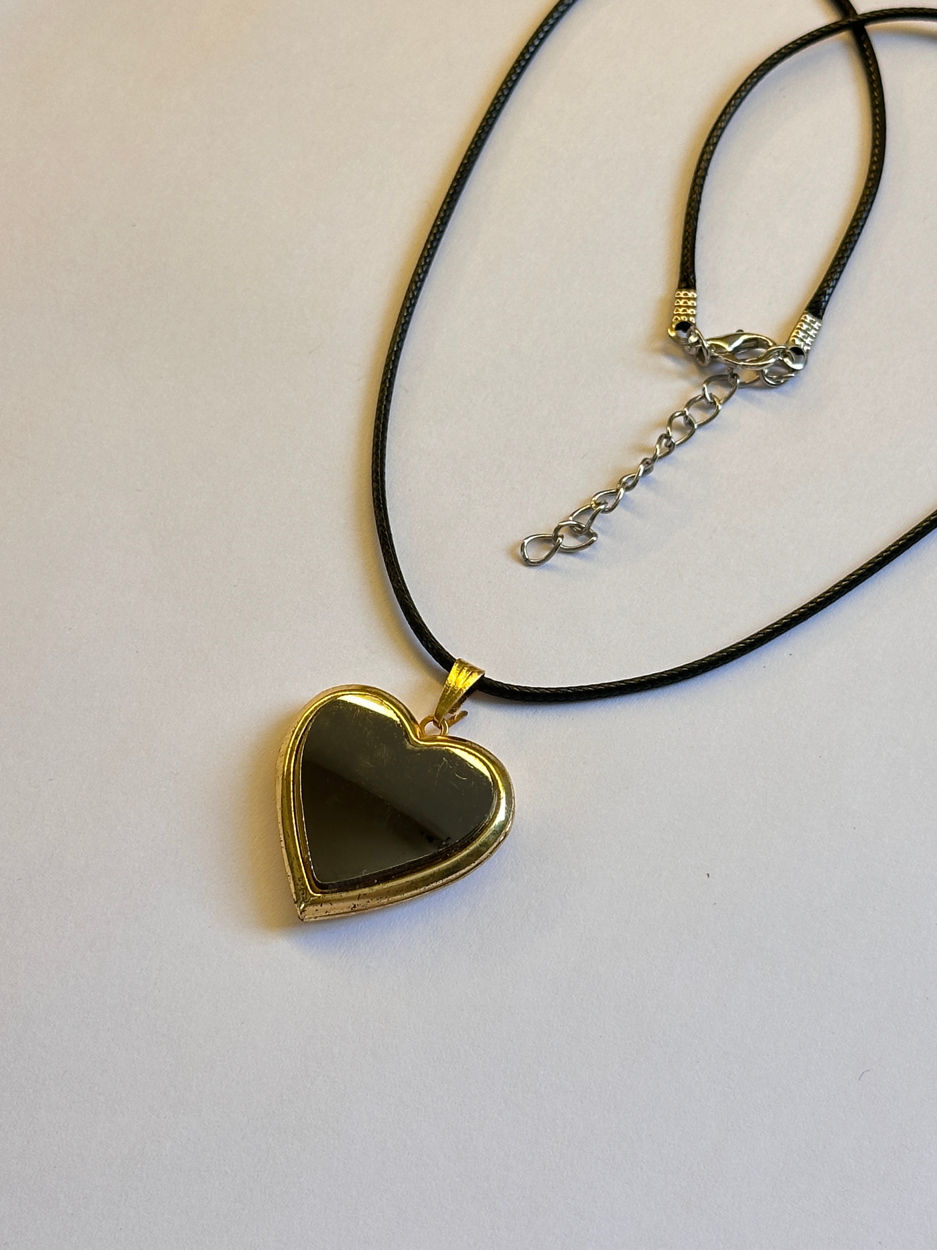 Openable heart mirror locket