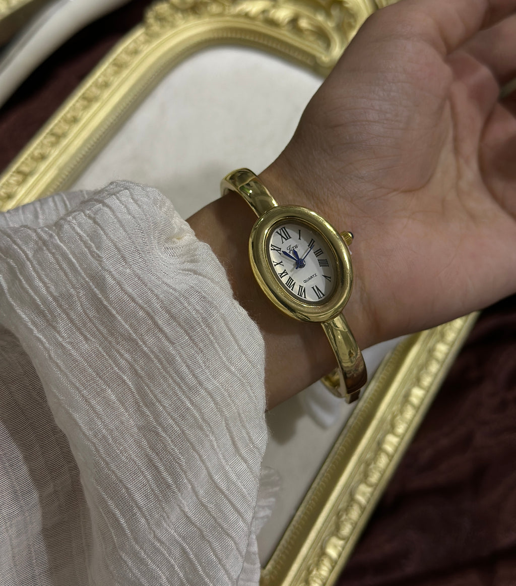 The signature gold watch