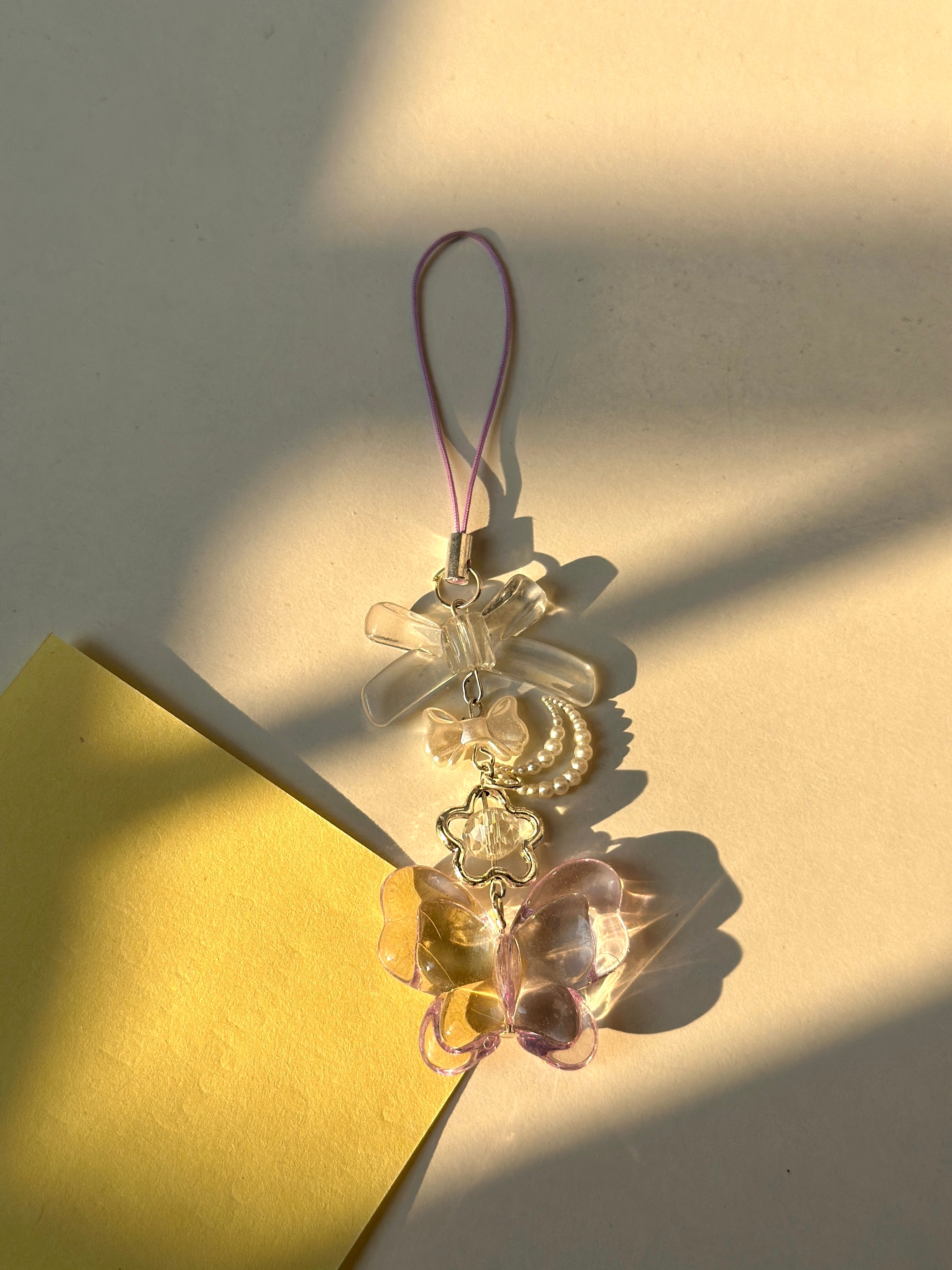 Shiny butterfly charm