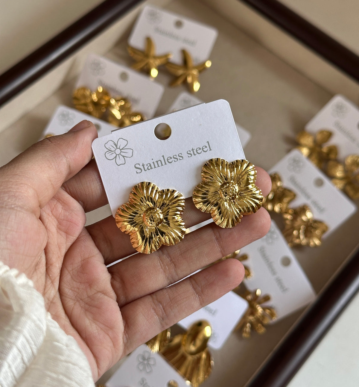 Flower fish earring