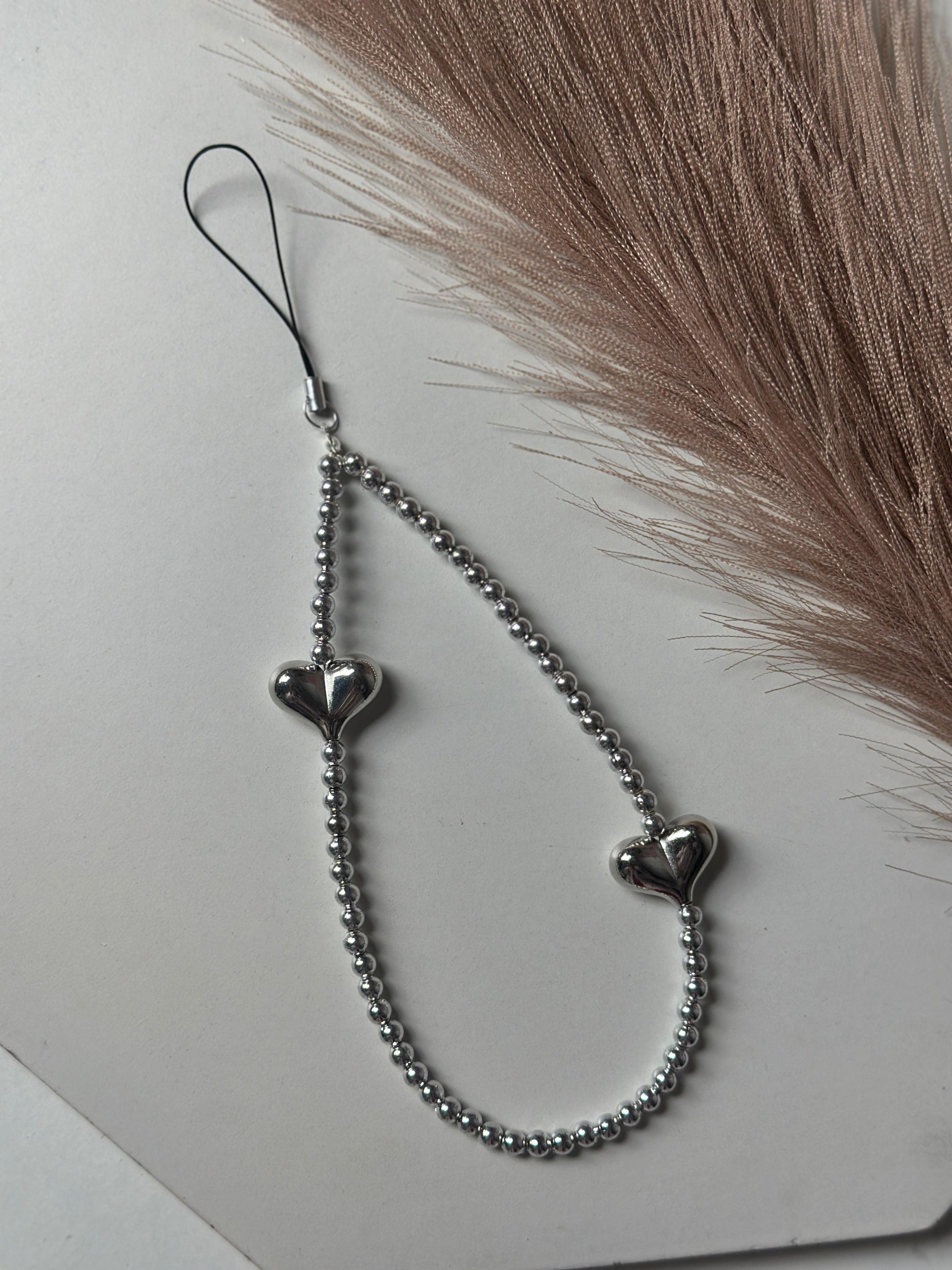 Silver phone charm