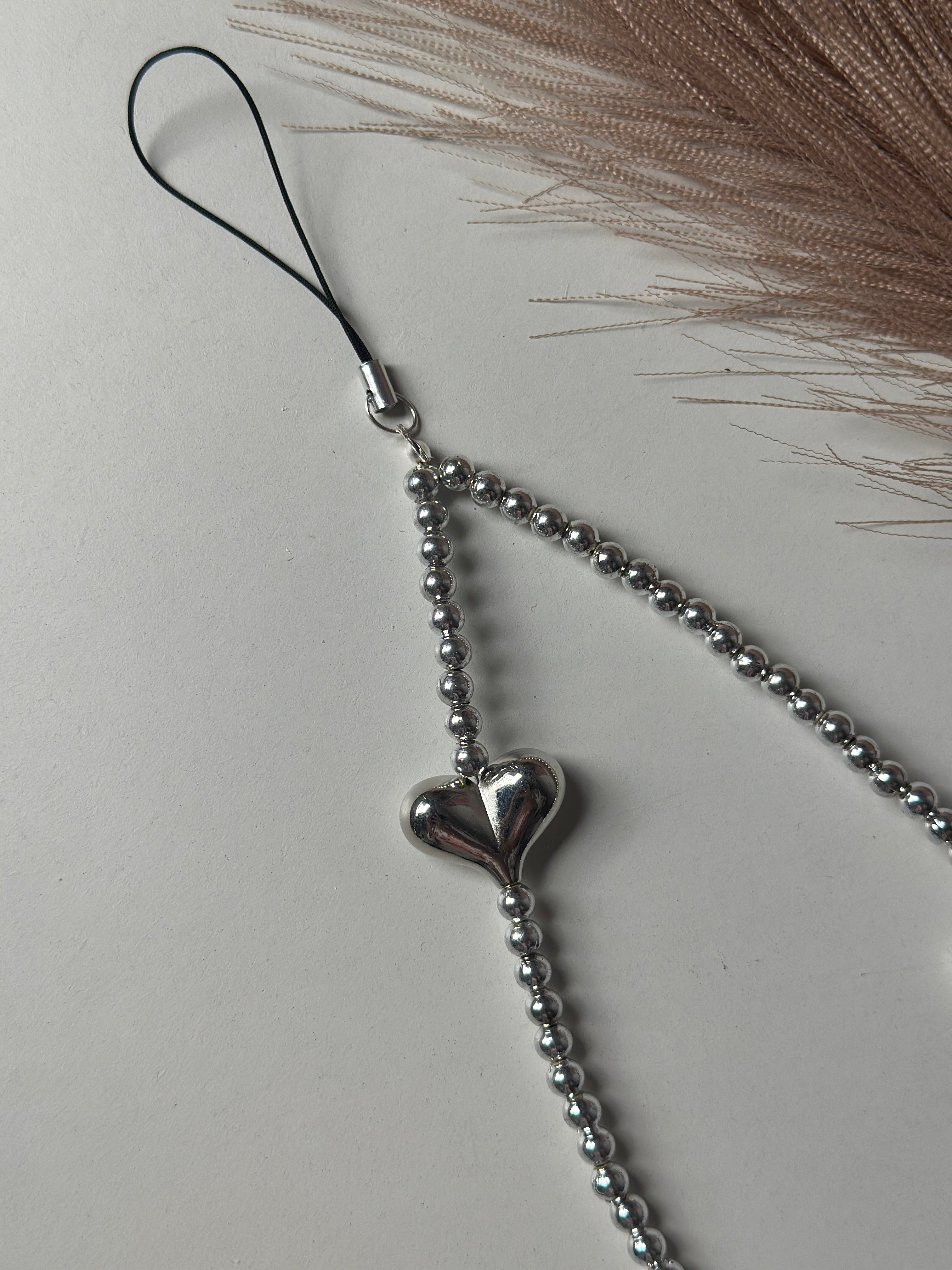 Silver phone charm