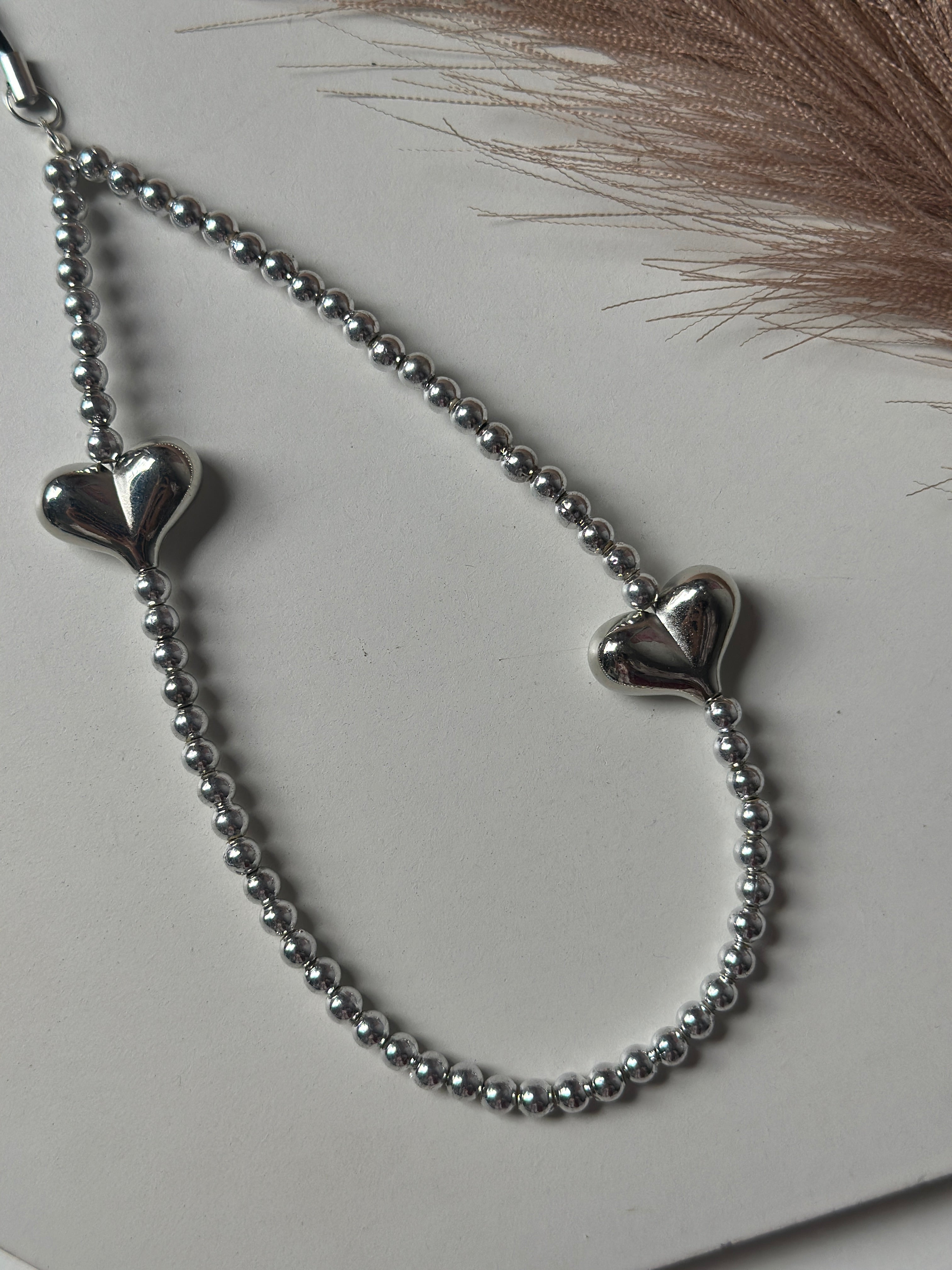 Silver phone charm