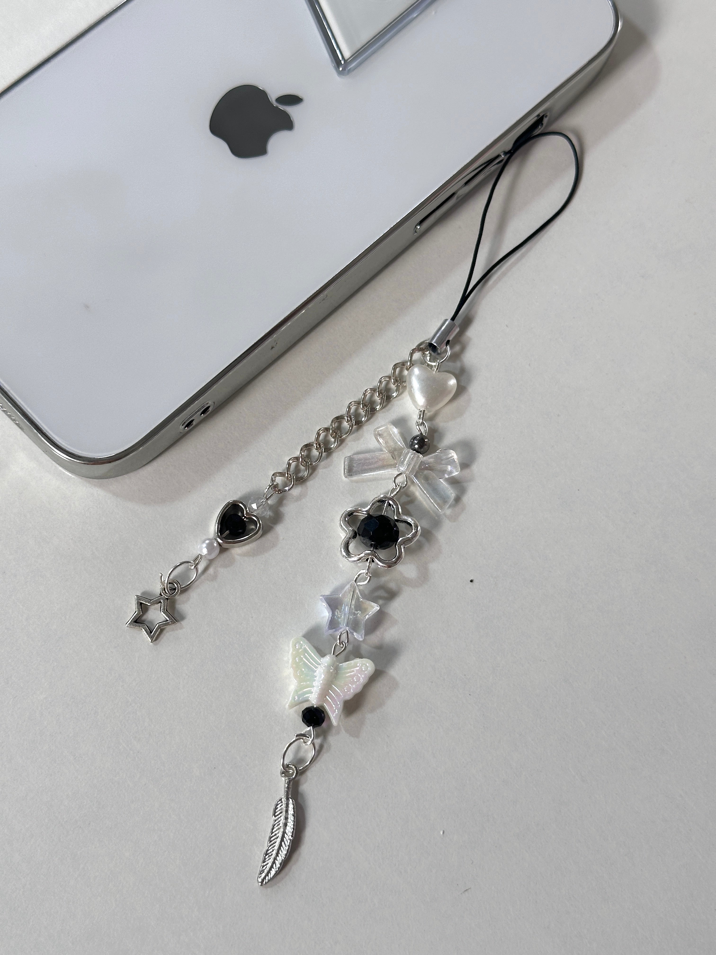 Feather phone charm