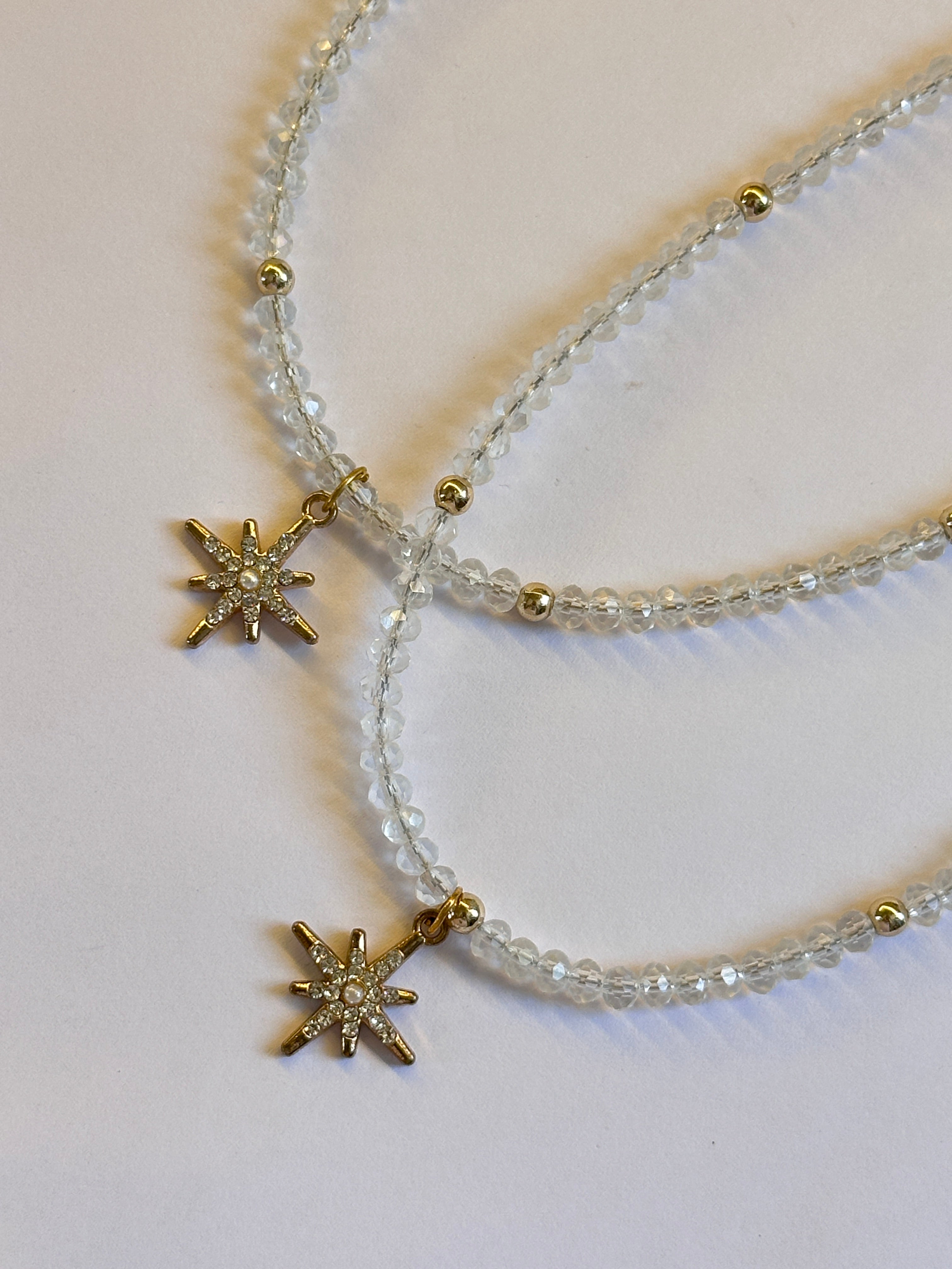 Transparent beaded charm necklace
