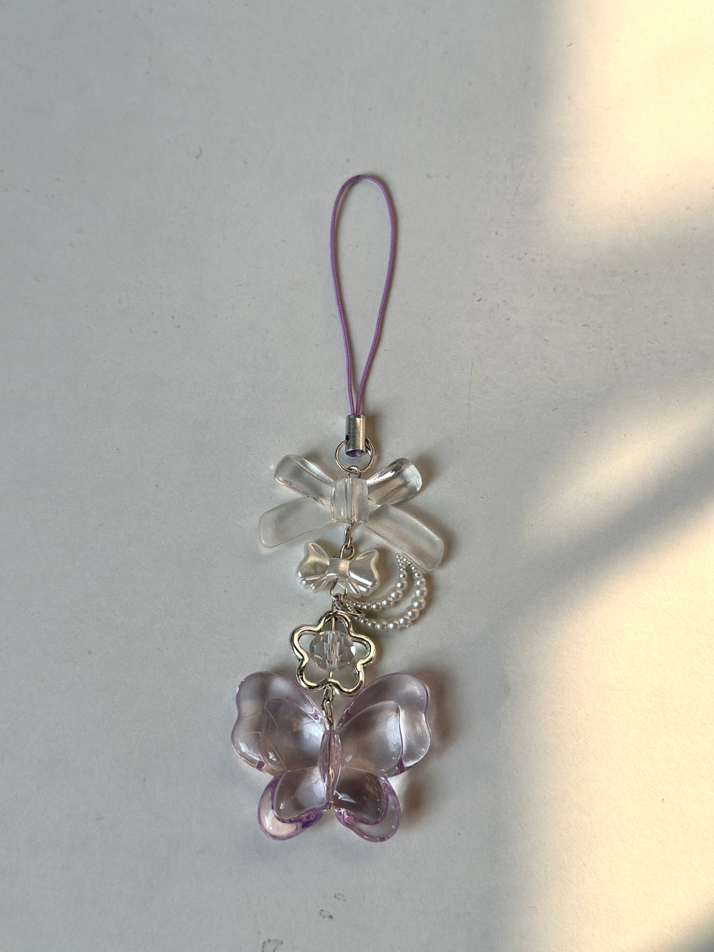 Shiny butterfly charm
