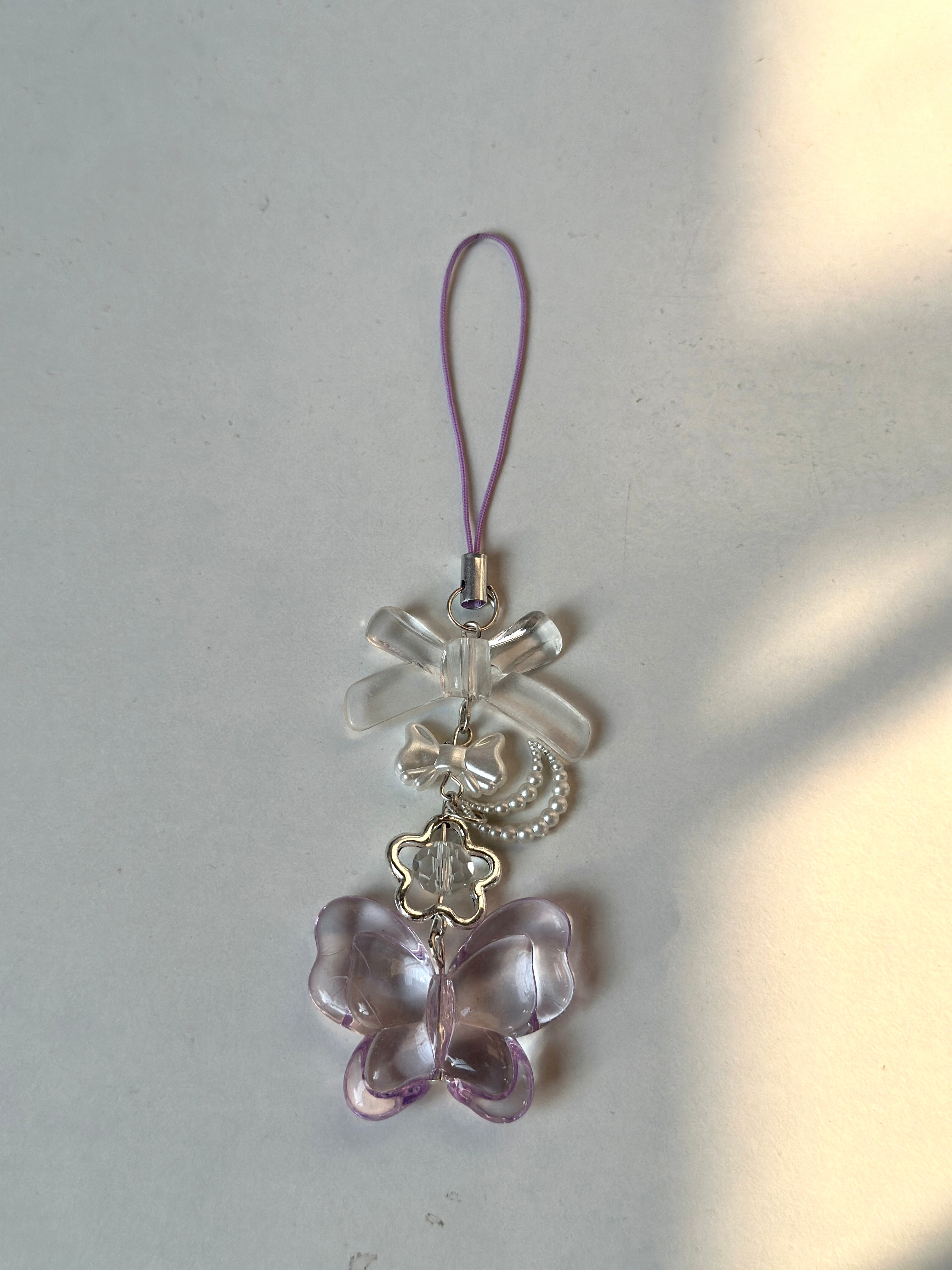 Shiny butterfly charm