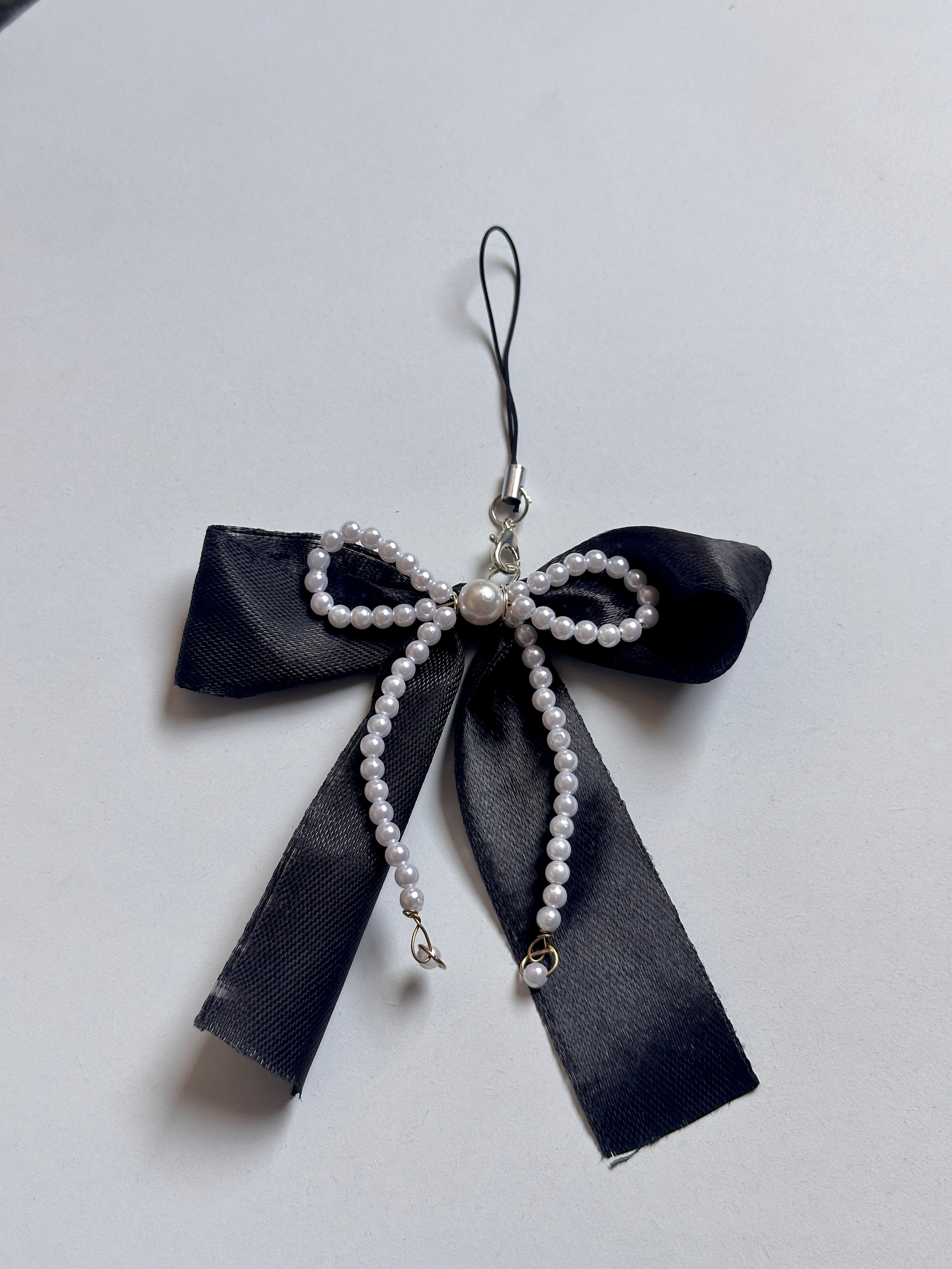 Black bow charm