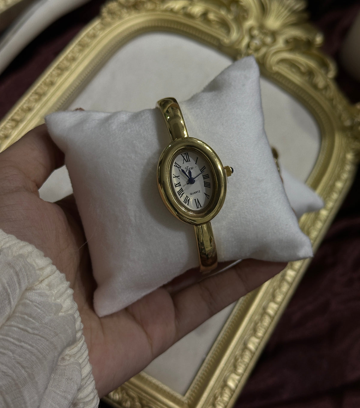 The signature gold watch