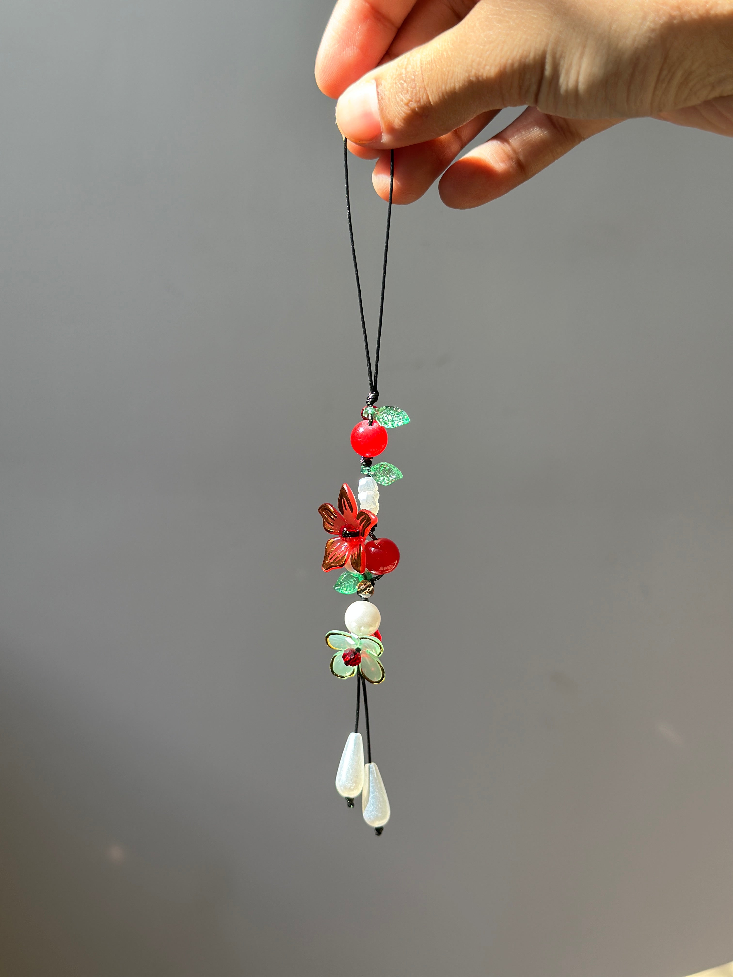 Red flower charm