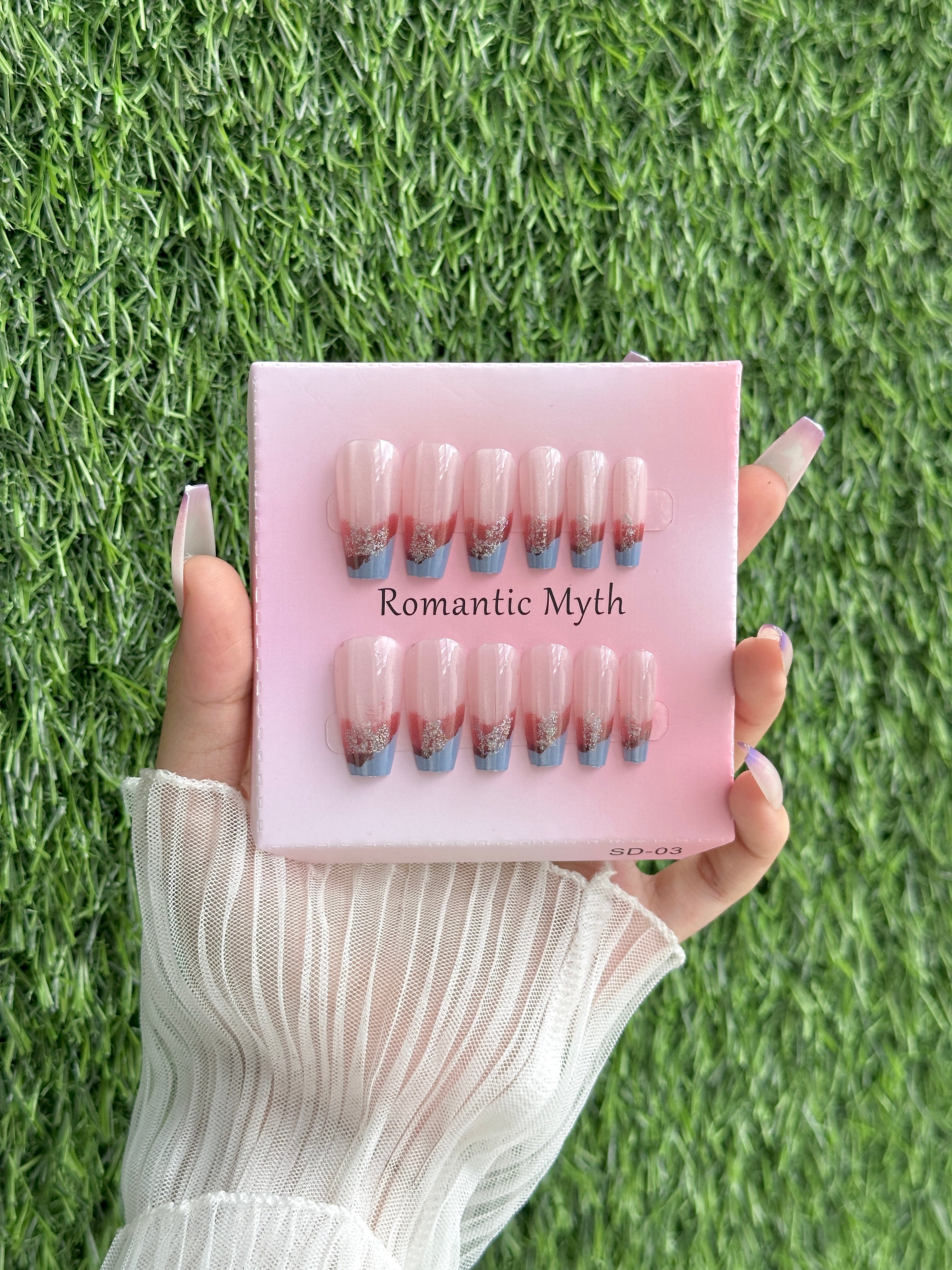 Three shaded glossy nails