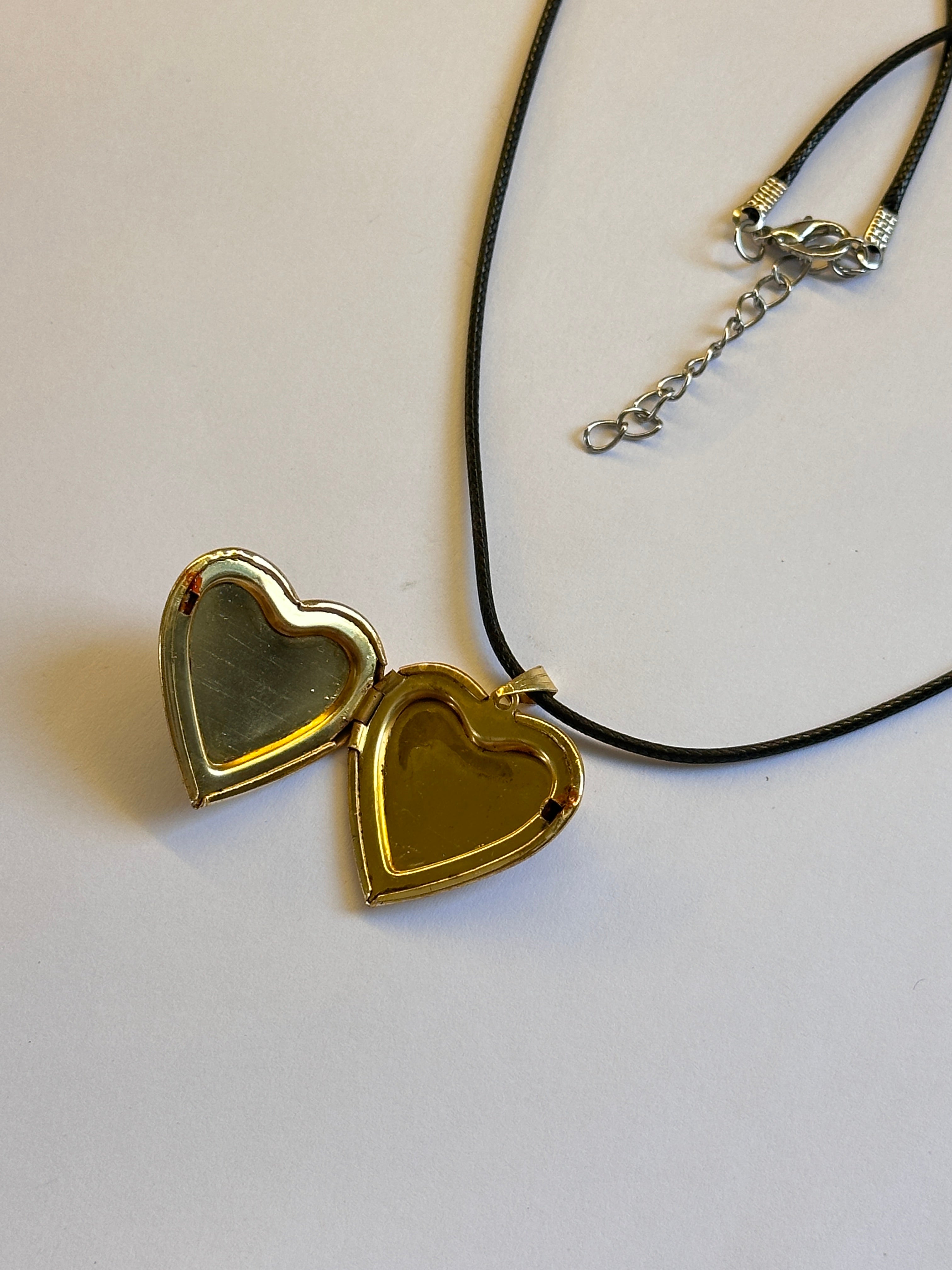 Openable heart mirror locket