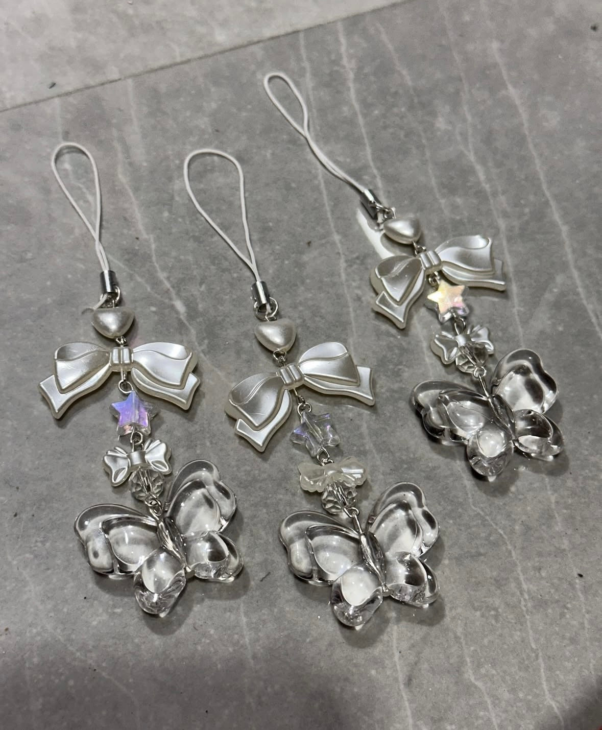 Transparent butterfly charm